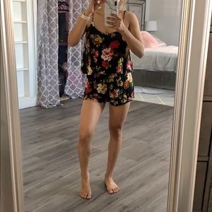 Spaghetti strap black floral romper.